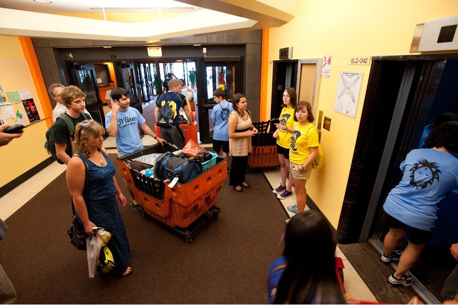 Students waiting for the elevator on move-in day.