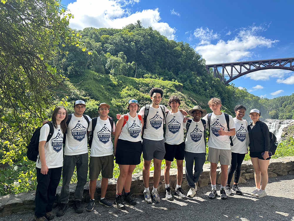 Photo of previous pre-semester program students with backpacks on hiking at a park
