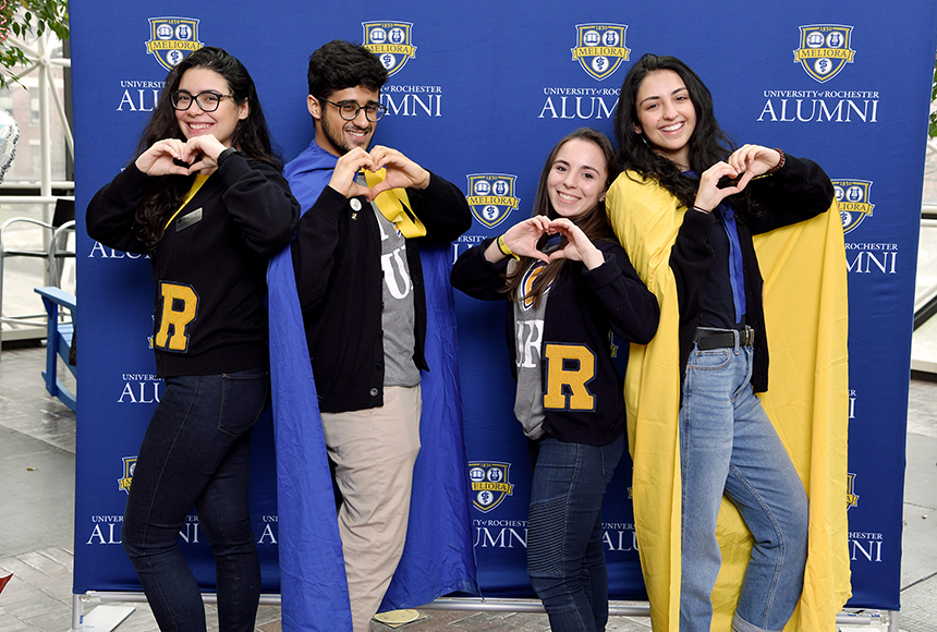 Students posing in UR gear at a previous I Heart UR Day.