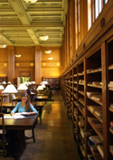 student reading in Rush Rhees Library