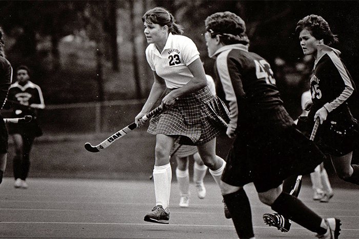 Nancy Melvin Taylor playing field hockey