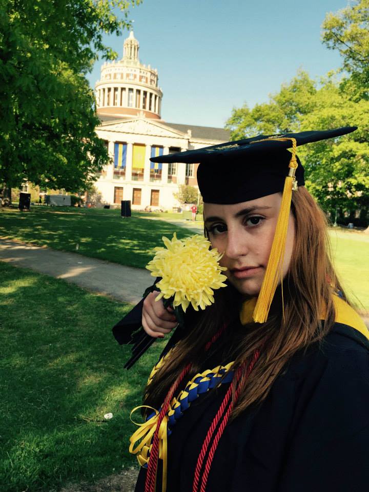 Christina Smiros in cap and gown in quad