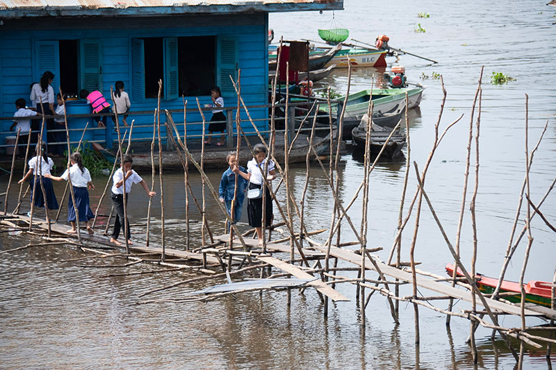 Students walking the bridge between schools