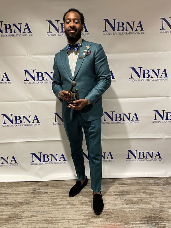 Perpignan after he received the 2023 DAISY Health Equity Award