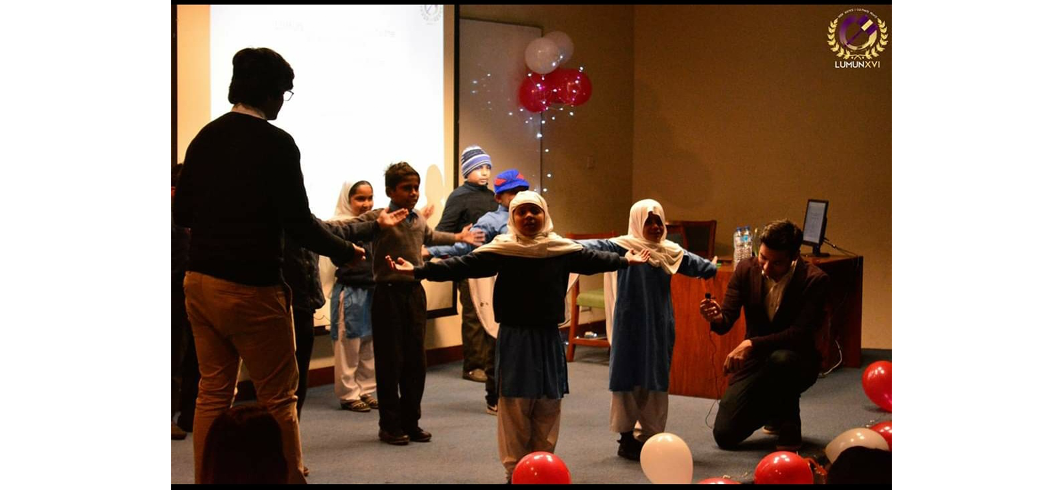 Grade 2 students putting on a talent show for a nearby college