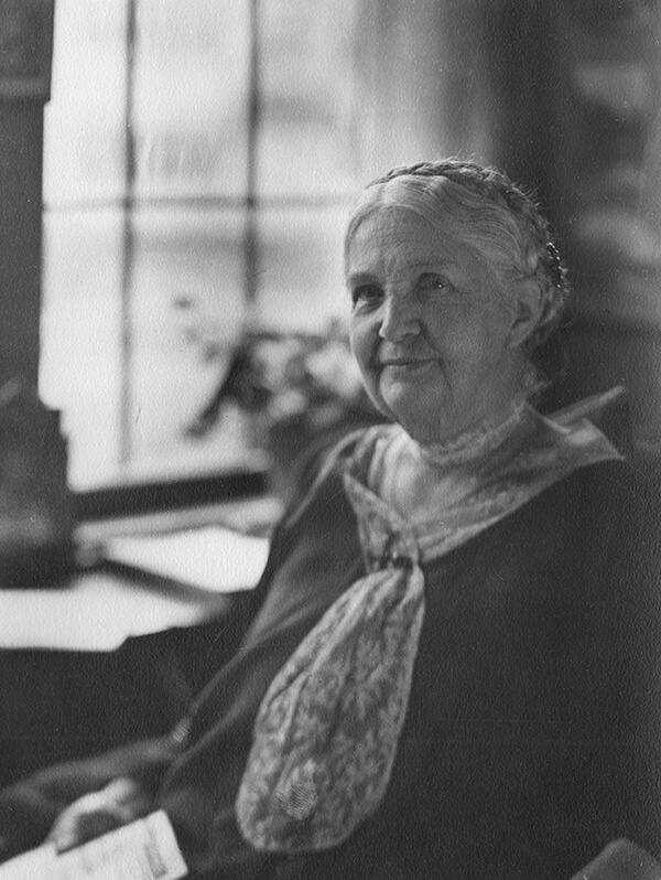 page18_inreview_ATA_Gannett_grayscale-600x798 black and white portrait of Mary Gannett as she is sitting in a chair