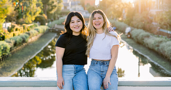 Yuting Yang and Anna Gaines posing together for an outdoor picture