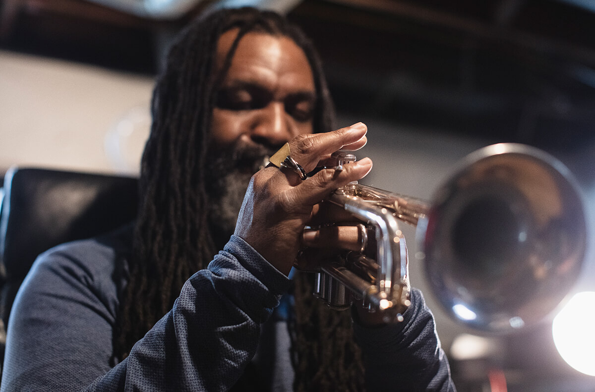 photo of herb smith playing a trumpet