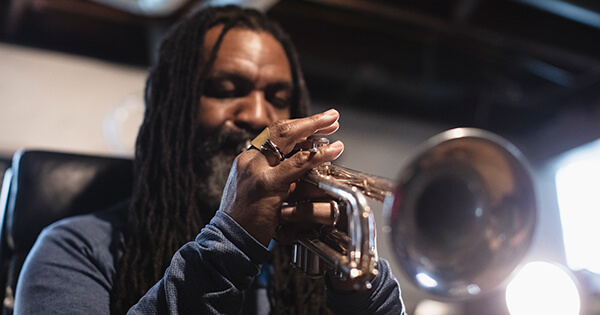 photo of herb smith playing a trumpet