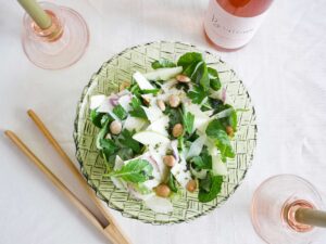 Rosé with shaved celery root, fennel, and apple salad with Manchego and Marcona almonds