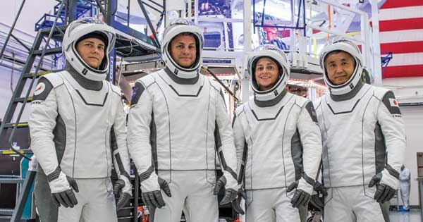 Josh Cassada ’00 (PhD) (second from left) and SpaceX astronauts Anna Kikina, Nicole Mann, and Koichi Wakata suited up to test equipment at SpaceX headquarters in California in the days leading up to their October mission to the International Space Station.