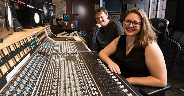 Rob McIntyre, an Emmy award-winning supervising sound editor and sound designer, and Grace Stensland ’23 in Gavett Hall’s recording studio.