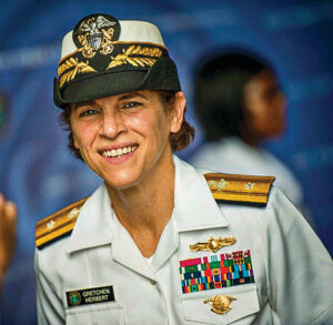 Gretchen Herbert ’84 smiling in Navy Uniform