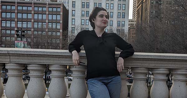 Gabrielle Dimoff ’18 posing in front of a bannister