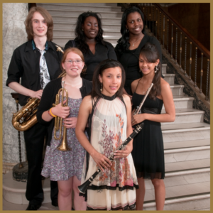 group of young students holding various instruments