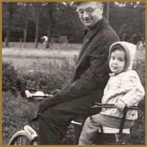 Image of Will Gay Bottje on bike with small child