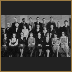 group of masters students sitting for photo