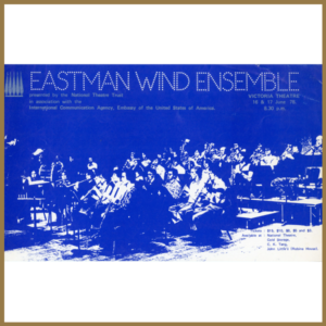 blue and white image of an orchestra used on the front of the program