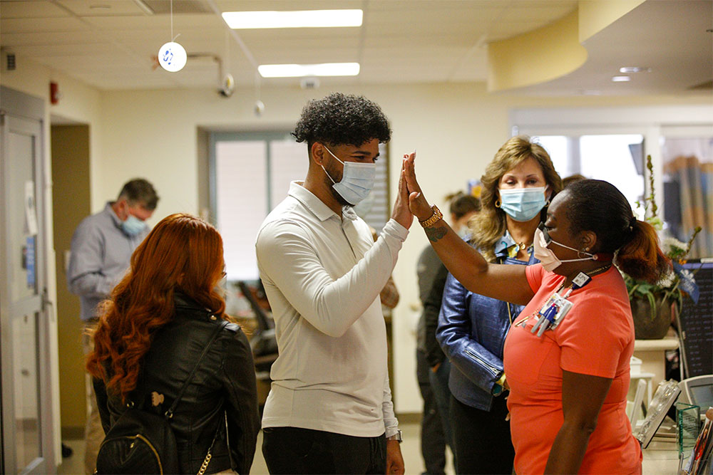 Brito returns to visit with the staff who saved his life.