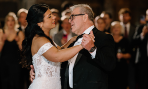 Former Olympic hockey player Gaetano "Gates" Orlando dances with his daughter on her wedding day.