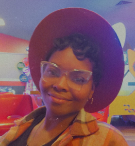 photo of Ashley Cuylear in a hat