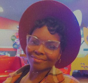 photo of Ashley Cuylear in a hat