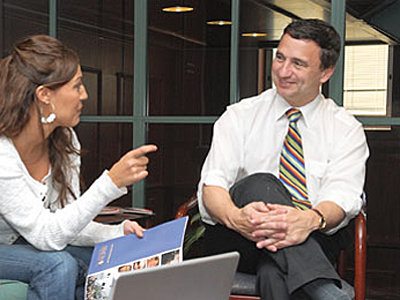 Simon School Dean Mark Zupan with Student