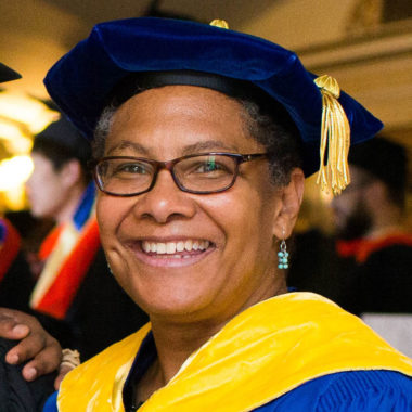 Lisa Norwood in a cap and gown