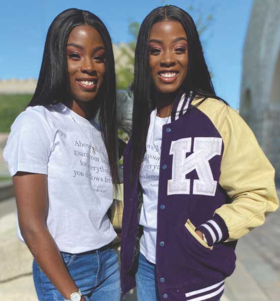 twin sisters ranae and shanae mckenzie smiling and posing next to each other