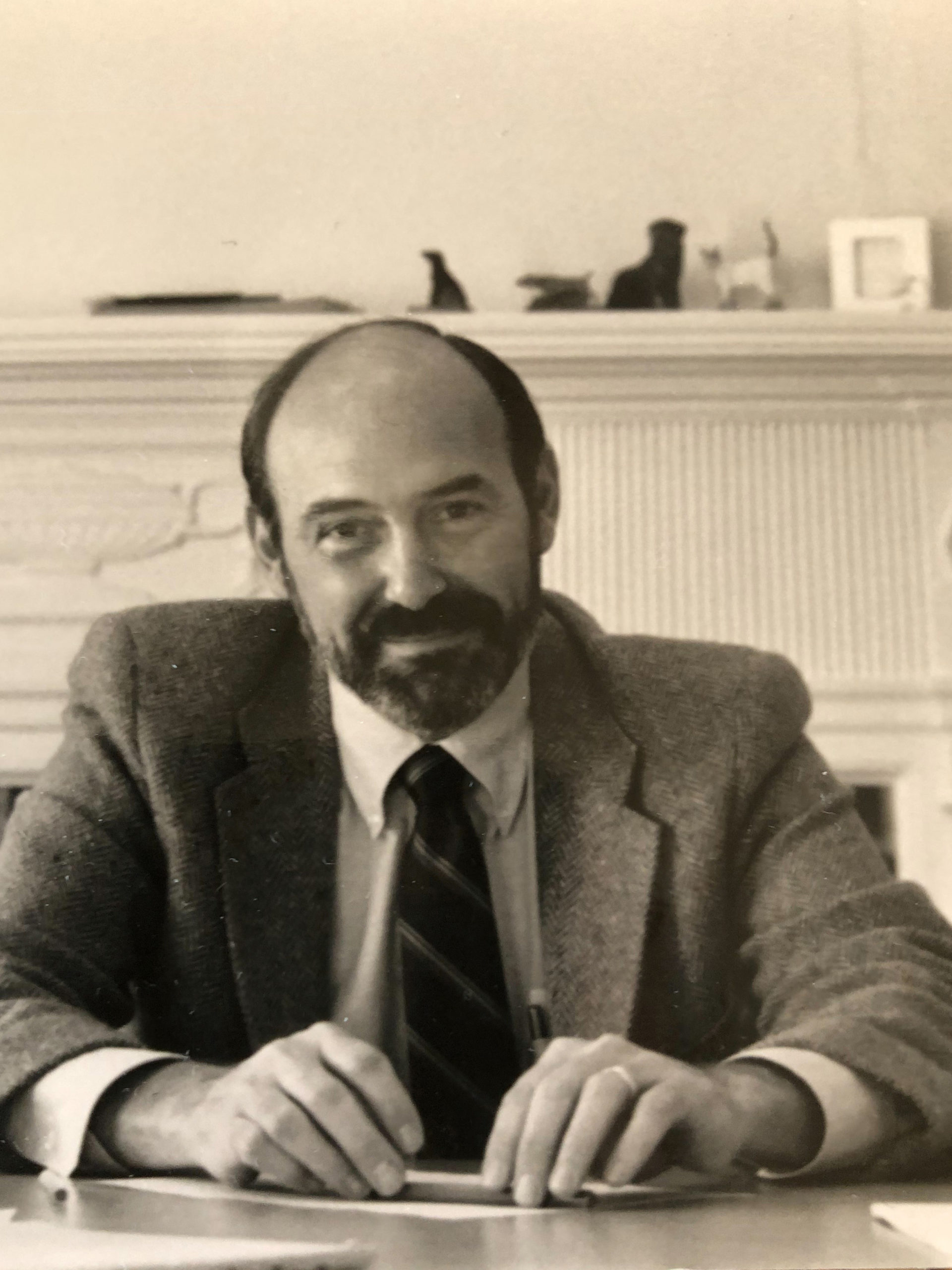 Bob in his office sitting at his desk