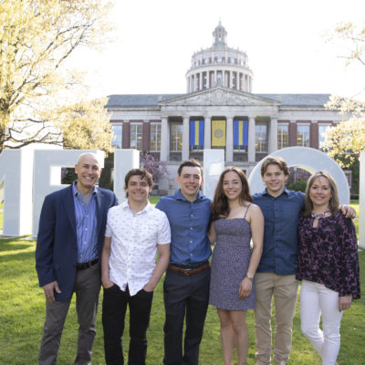 Orup family in front or Rush Rhees