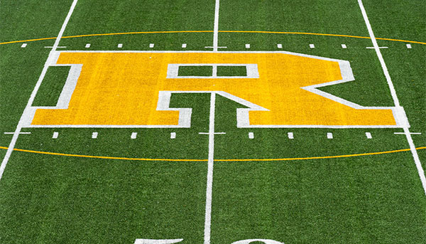 yellow rochester R on the 50 yard line