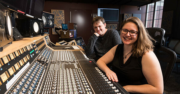 Rob McIntyre and Grace Stensland ’23 in Gavett Hall’s recording studio.