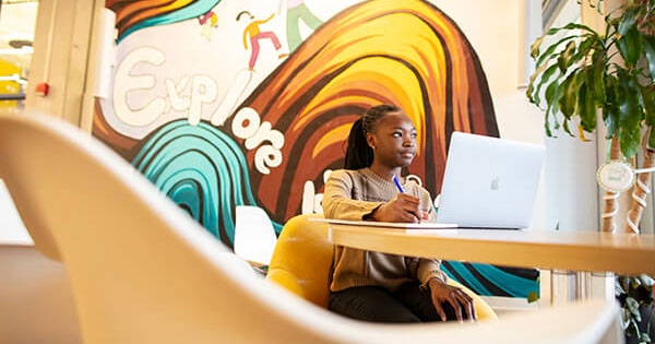 Fredricka Amoah ’26 studying in front of laptop
