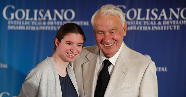 Tom Golisano poses for a picture with Shannon Salluzzo, 19, of Penfield, New York.