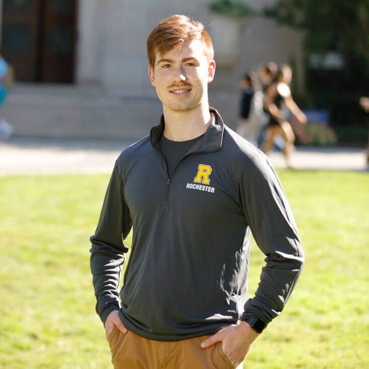 student wearing quarter zip pullover