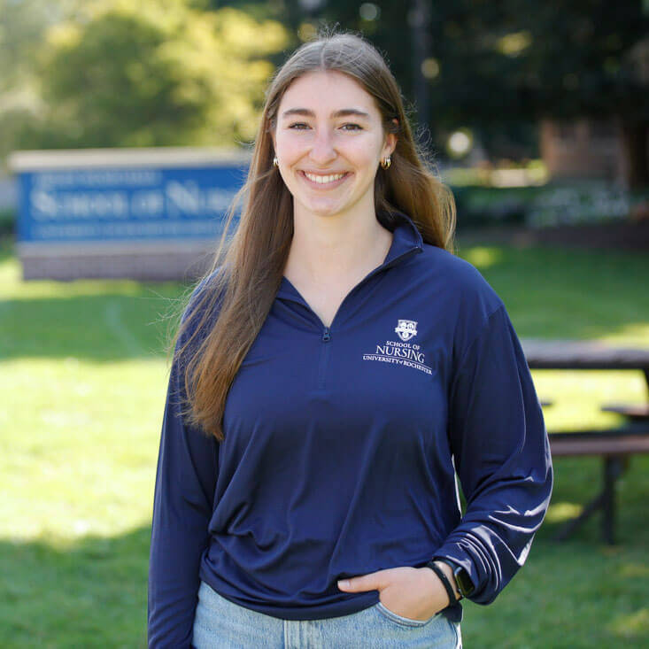 student wearing quarter zip pullover