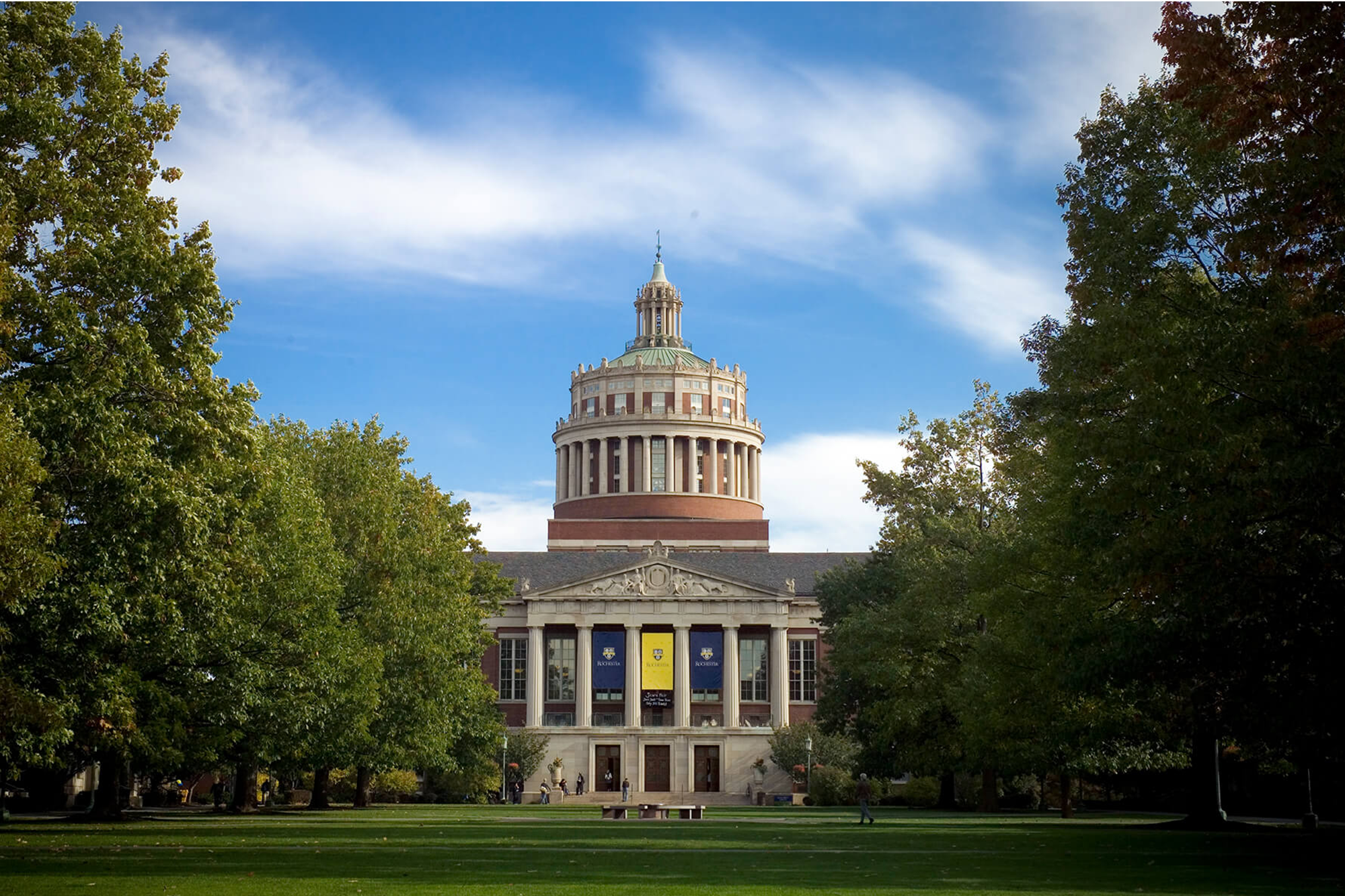 Rush Rhees entrance with library tower, and green lush trees on either side