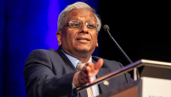 Govind P. Agrawal speaking at a lecturn