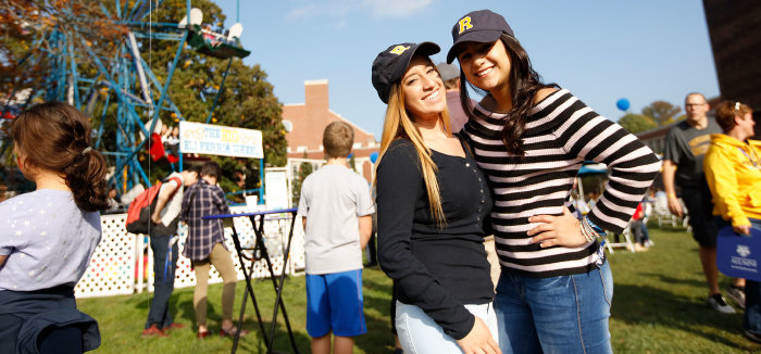 2 women posing for a camera