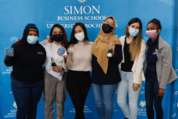 group of students posing in photo booth