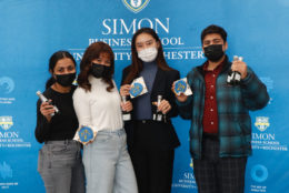 group posing in photo booth