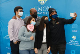 group posing in photo booth