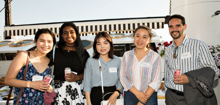 5 people smiling for the camera