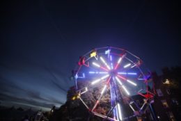 ferris wheel with lights at night