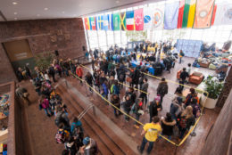 overhead of wilson commons and students in line for free t-shirt