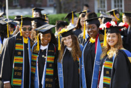 students posing for photo during after commencement