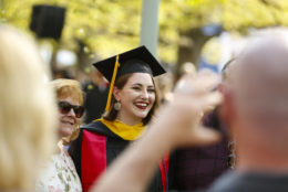 Parents take photos of their graduates after the University of Rochester commencement