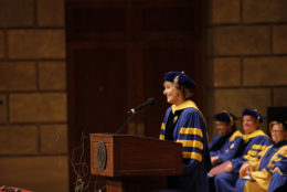 Cathy E Minehan gives a speech to the students