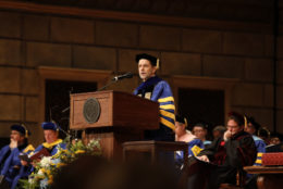 President Richard Feldman gives a speech to the students